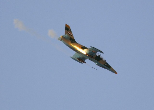 Sirijski avion Albatros L-39ZA raketira položaje FSA u okolini sela Tel Rafat, 37 km od Alepa, 9. avgust 2012. godine, Foto: Goran Tomašević, Rojters